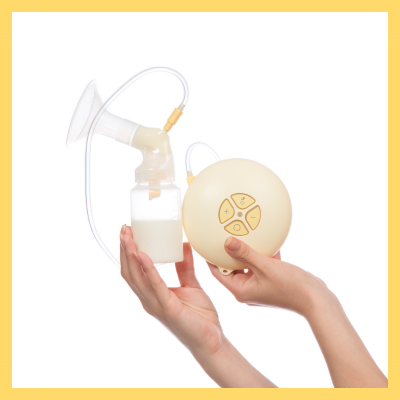 Medela breast pump with expressed breastmilk stored in the bottle